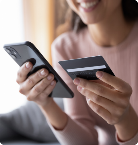 Female making a mobile payment using her credit card