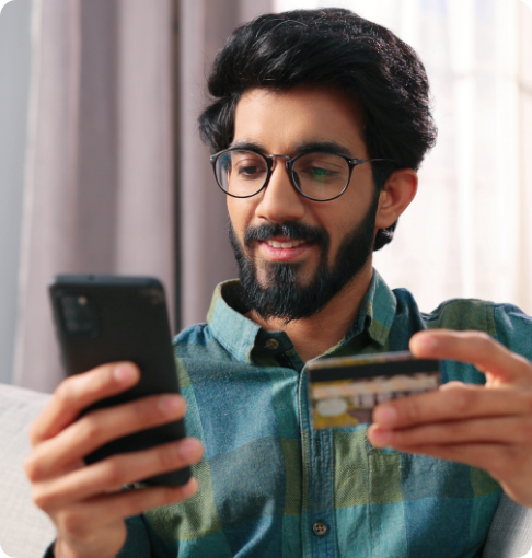 Gastroenterologist patient making a credit card payment on their cell phone