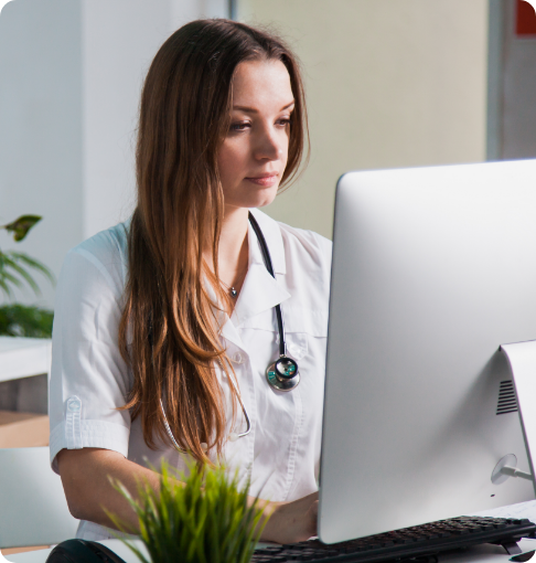 Front-of-office staff monitoring analytics on computer