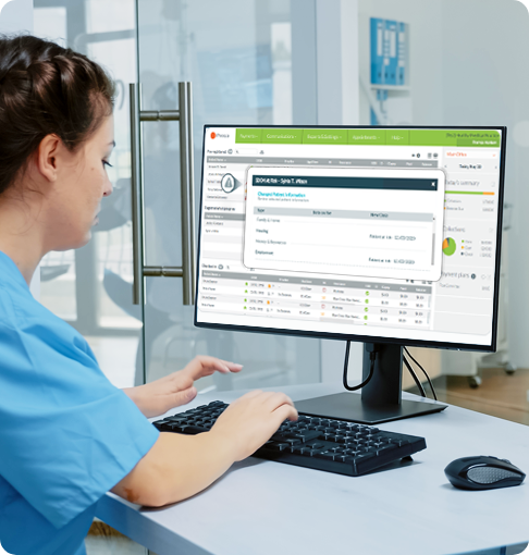 Nurse looking at SDOH information on desktop computer screen