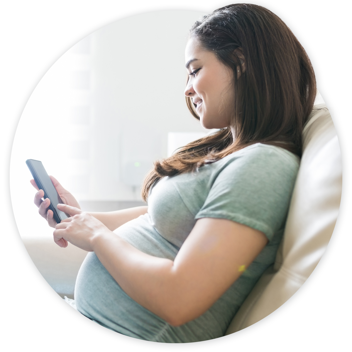 OB-Hero_2 Pregnant woman making OB/GYN appointment on mobile phone