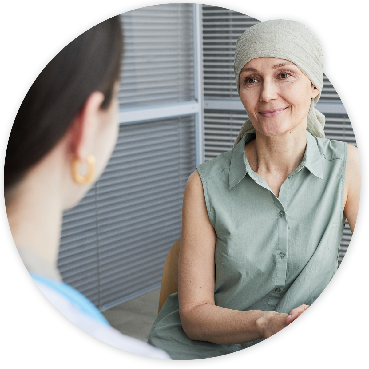 Cancer patient talking with an oncologist during appointment