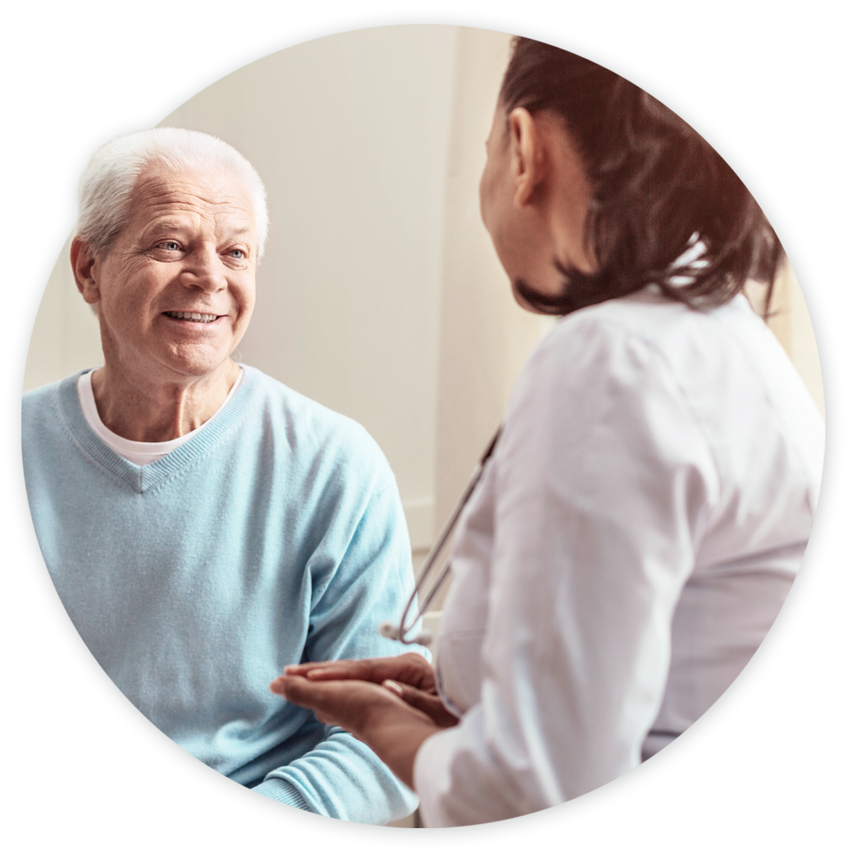 Urologist talking to older male patient