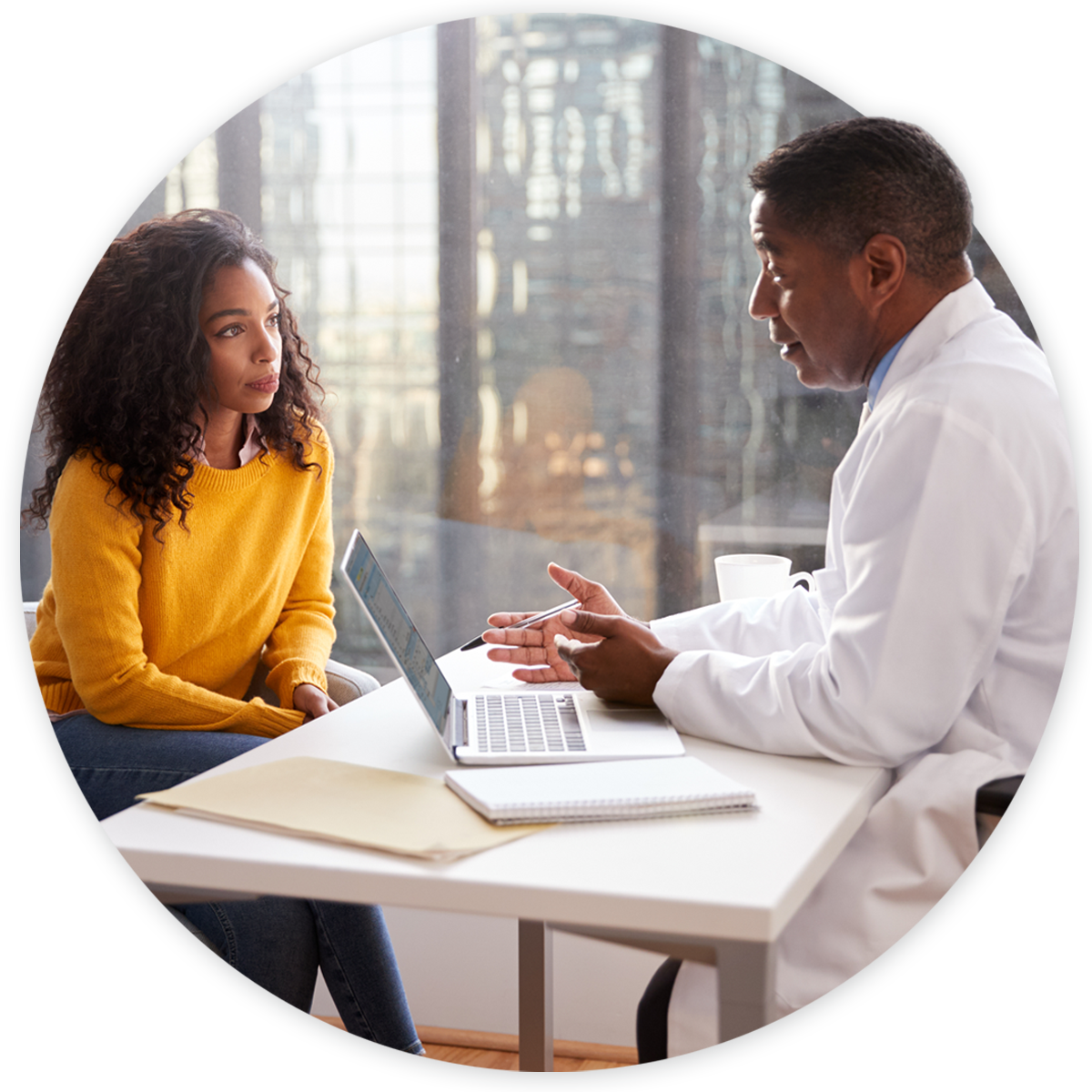 Female patient talking to behavioral health doctor