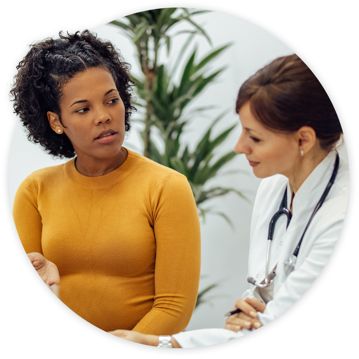 Female patient talking to gastroenterologist