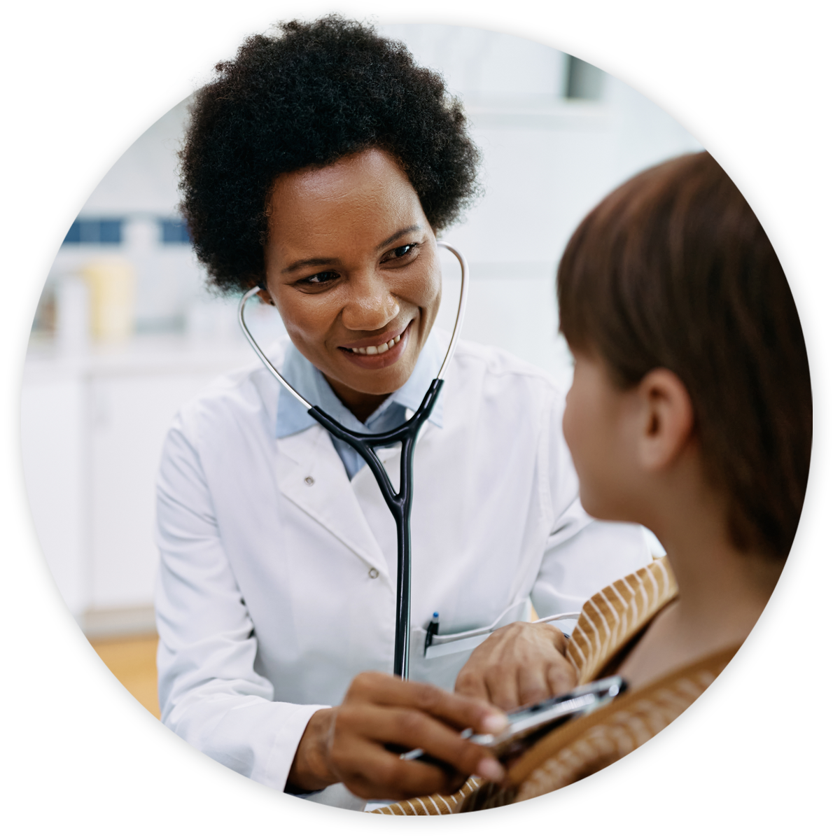 Doctor examining patient using stethoscope