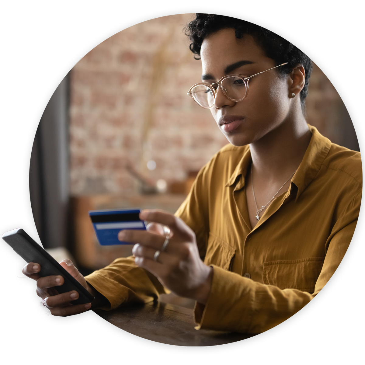 Woman going through the revenue cycle and making credit card payment on mobile phone