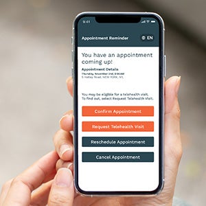 patient scheduling appointment reminder message from phreesia on smartphone