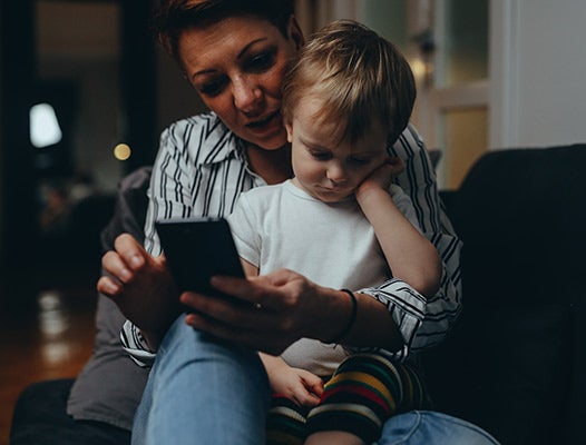 Mother calling doctor with sick child at night