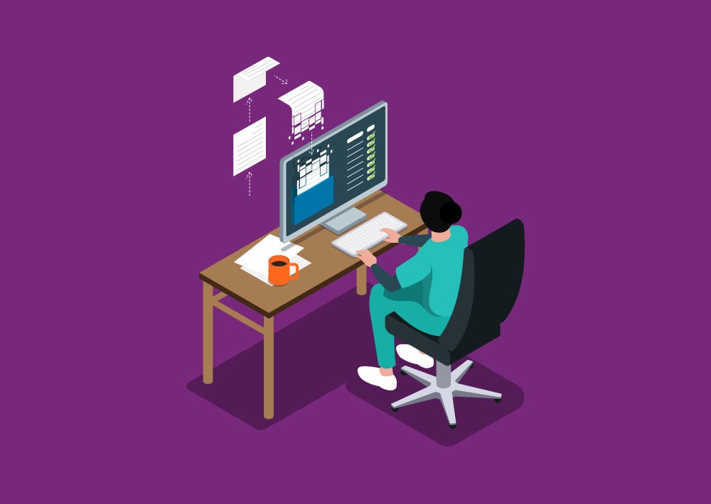 healthcare worker scanning paperwork at desk