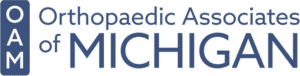 Orthopaedic Associates of Michigan logo featuring a blue square with white letters OAM and the organization name in blue text